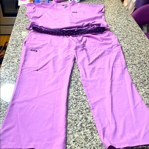 Koi Purple Scrub Set with Floral Waistband top is an XL and the pants is 2X Free